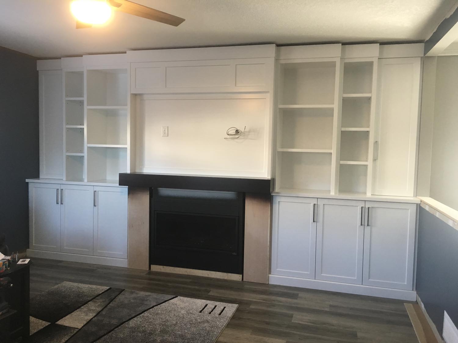 Built in cabinets around fireplace