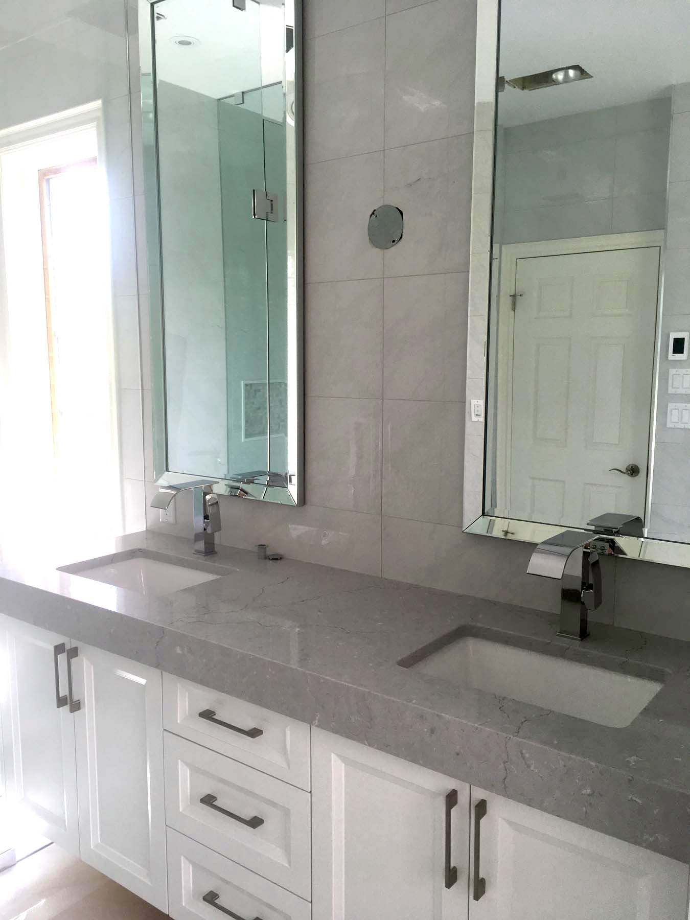 white bathroom cabinets with granite double sink
