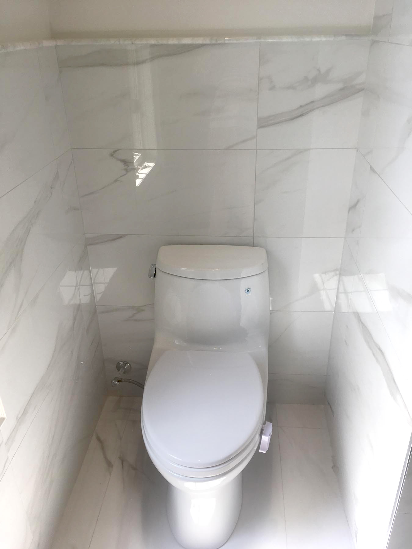 toilet privacy with marble wall